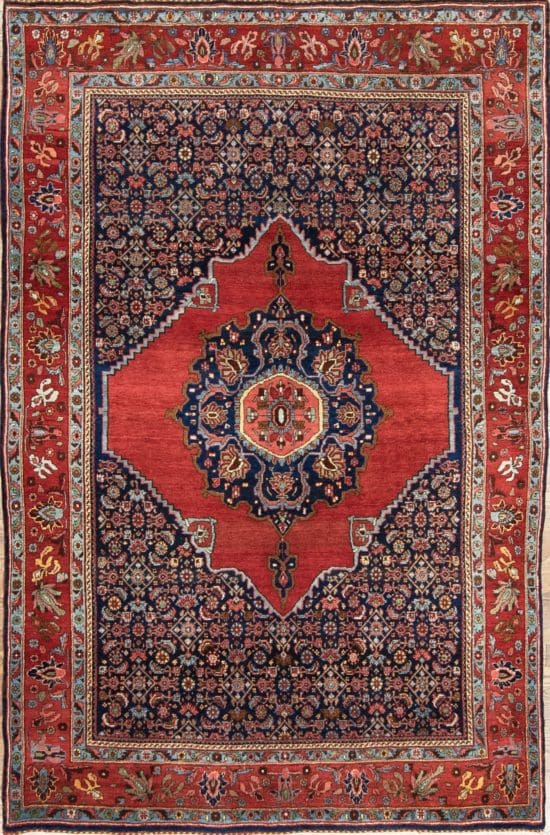 Handmade antique Persian Senneh rug, geometric and floral pattern with terracotta and navy-blue colors. Size 4.8x7.2.