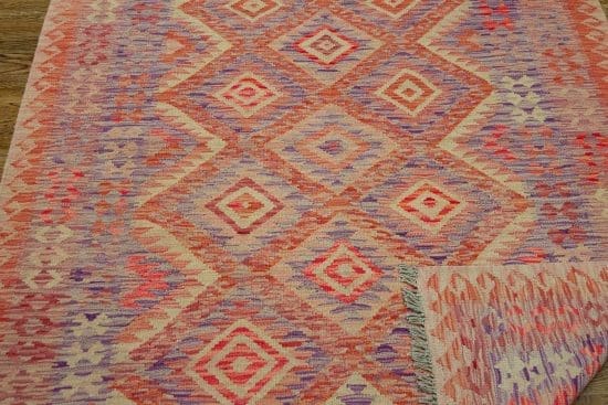 Handwoven multicolor flat weave geometric style kilim rug. Kilim size 4.10x6.3.