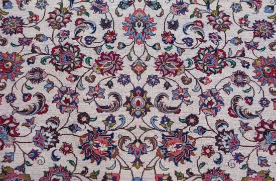 Handmade Persian Sarouk wool rug, floral design with white color in the primary field and red in the borders. Rug size 4.5x7.