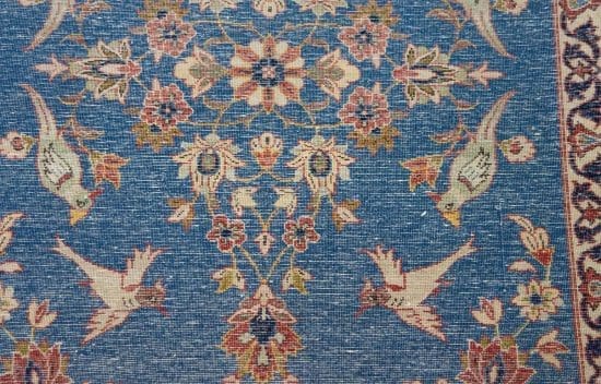 Handmade wool Persian Varamin blue rug with birds and flowers. Rug size 3.5x5.