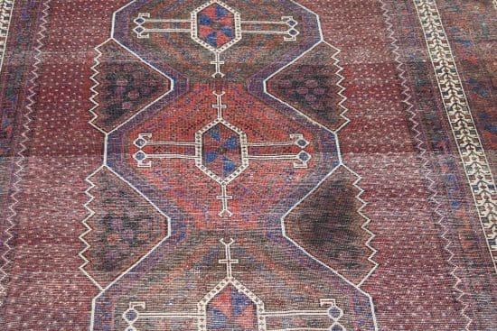 Handmade geometric style Persian Sirjan wool area rug in red color. Size 5.5x7.9.