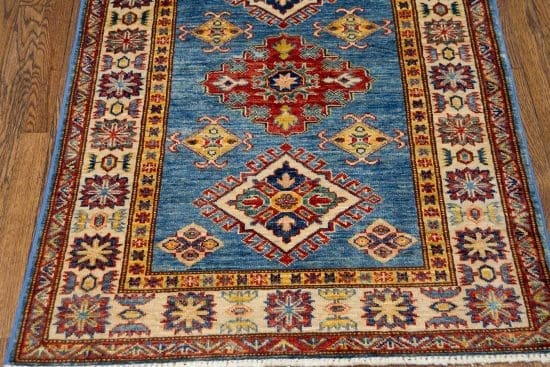 Handmade geometric style Kazak area rug in blue color. Size 3x4.5.
