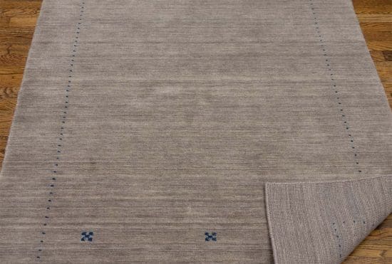 Thick wool hand loomed Gabbeh style contemporary oriental rug in gray color. Rug size 4.1x6.